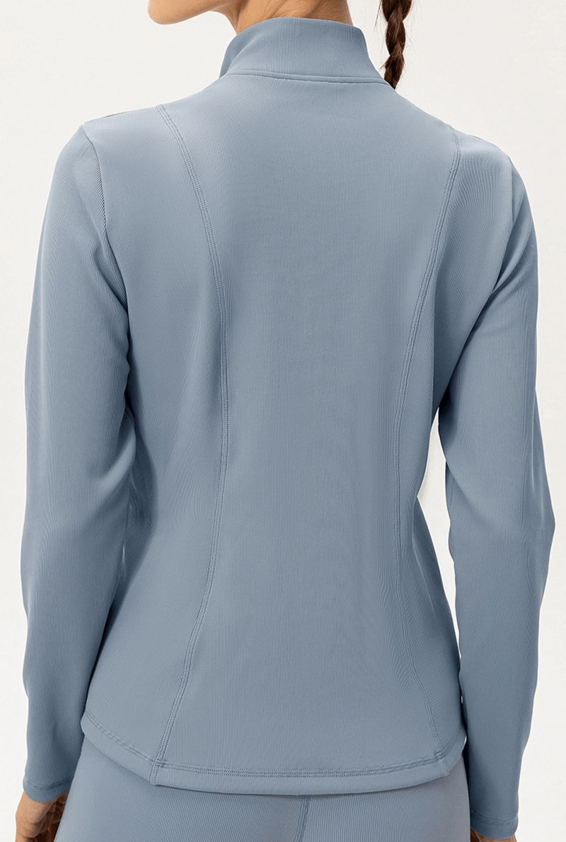 Back view of Sports Insulated Women's Jacket with high collar, fleece lining, and slim fit in blue